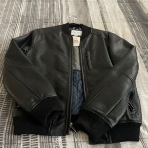 Come Haan jacket. New with tags. Excellent condition. Perfect for the holidays.